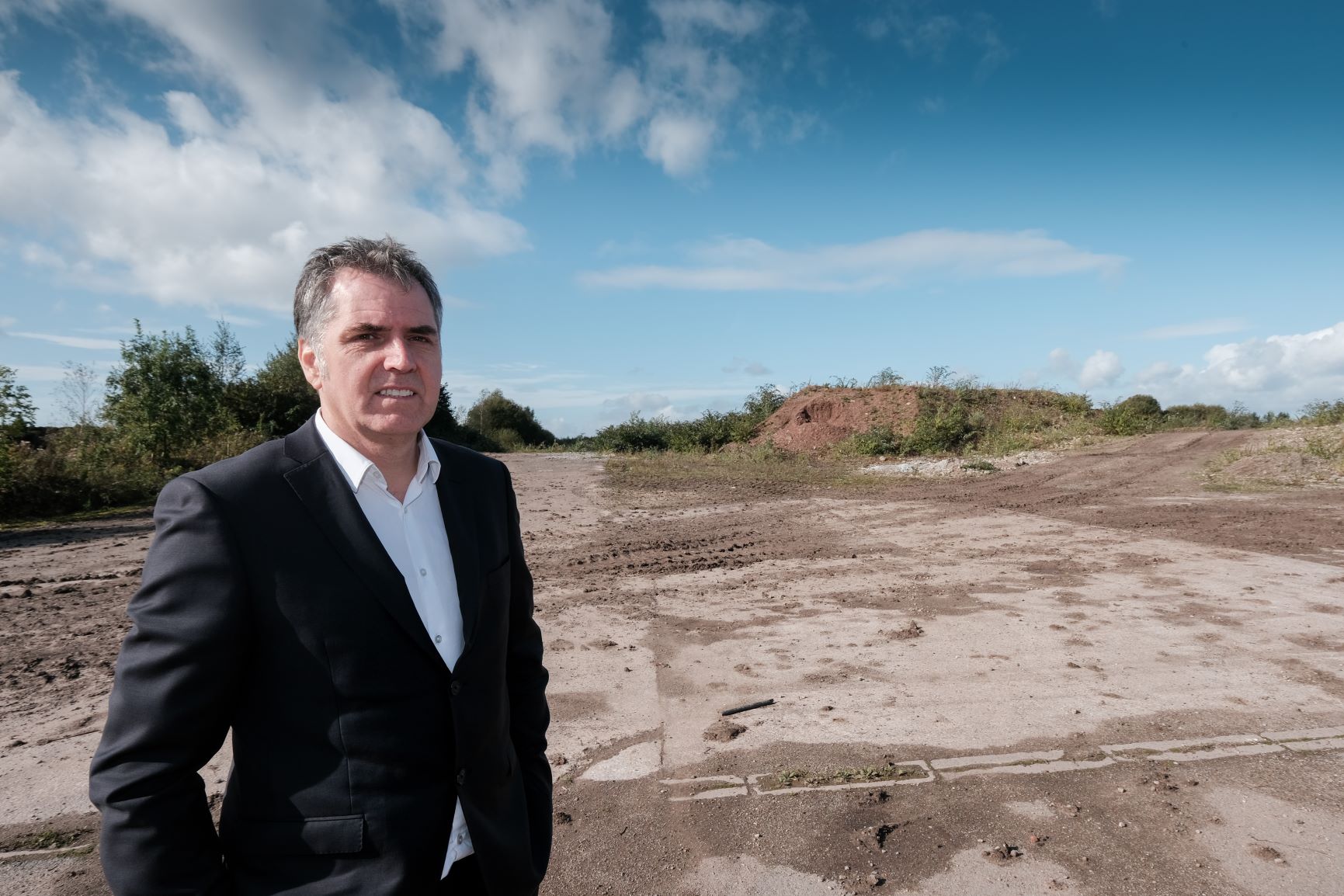 Steve Rotheram at the Moss Nook brownfield site St Helens