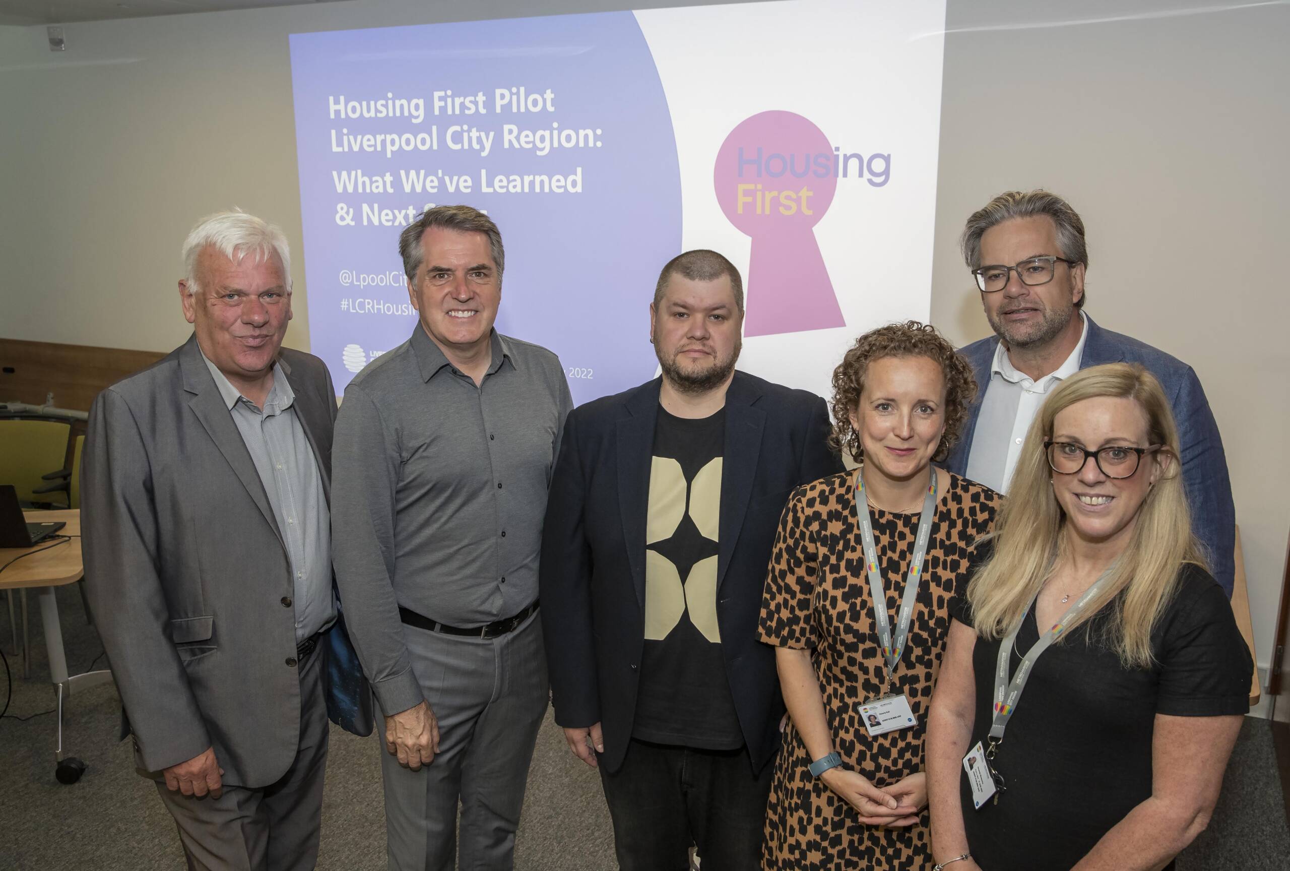 Image of Mayor and stakeholders at Housing First presentation