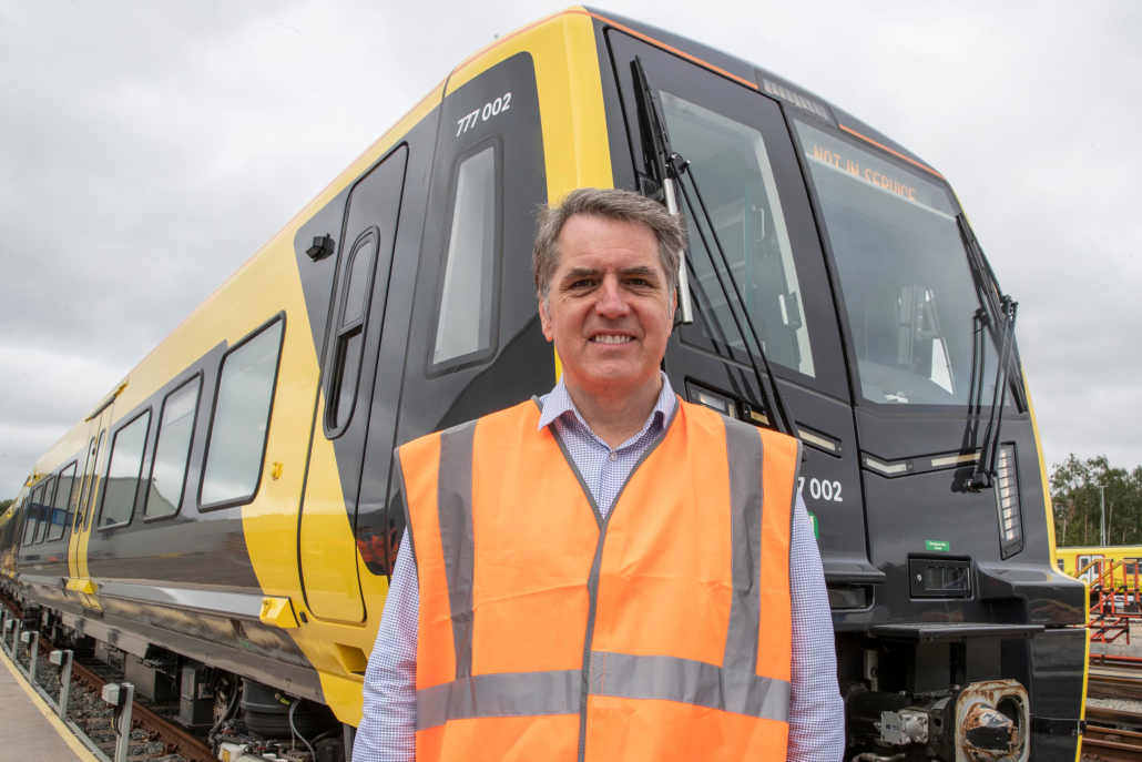 Mayor Steve Rotheram with one of the new publicly-owned 777 train