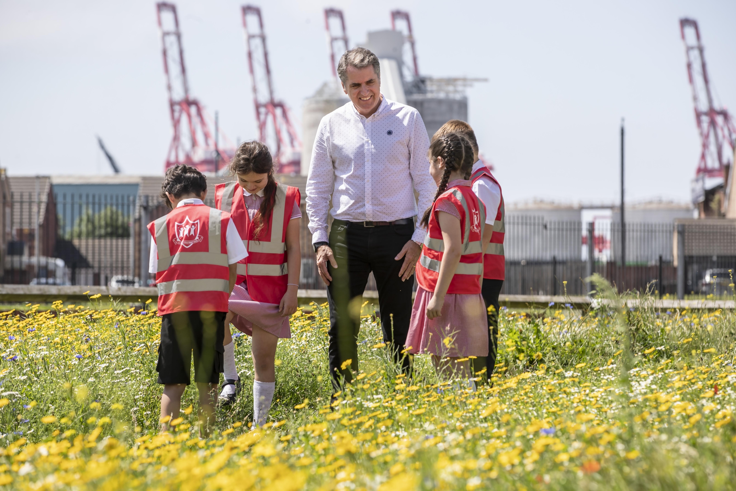 Mayor Steve Rotheram meets children who helped create a wildflower meadow trail of 10 sites from Everton in North Liverpool, through to Litherland in Sefton. The project was supported by the Mayor's Community Environment Fund in the summer of 2021.