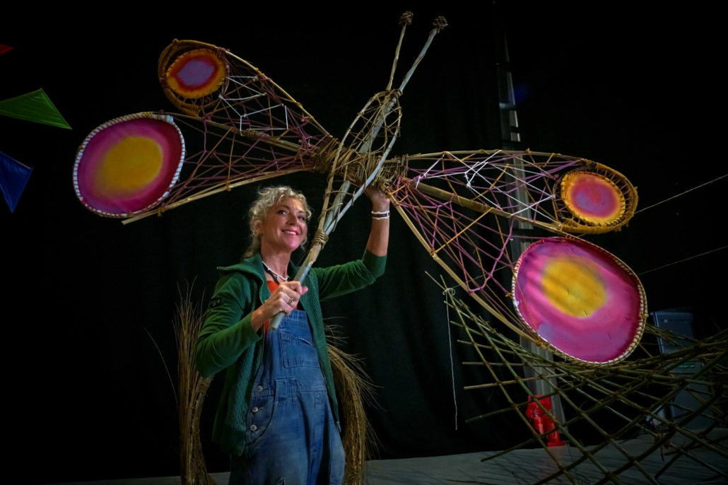 Artist Sarah Gallagher-Hayes with one of her bamboo butterflies she has created.