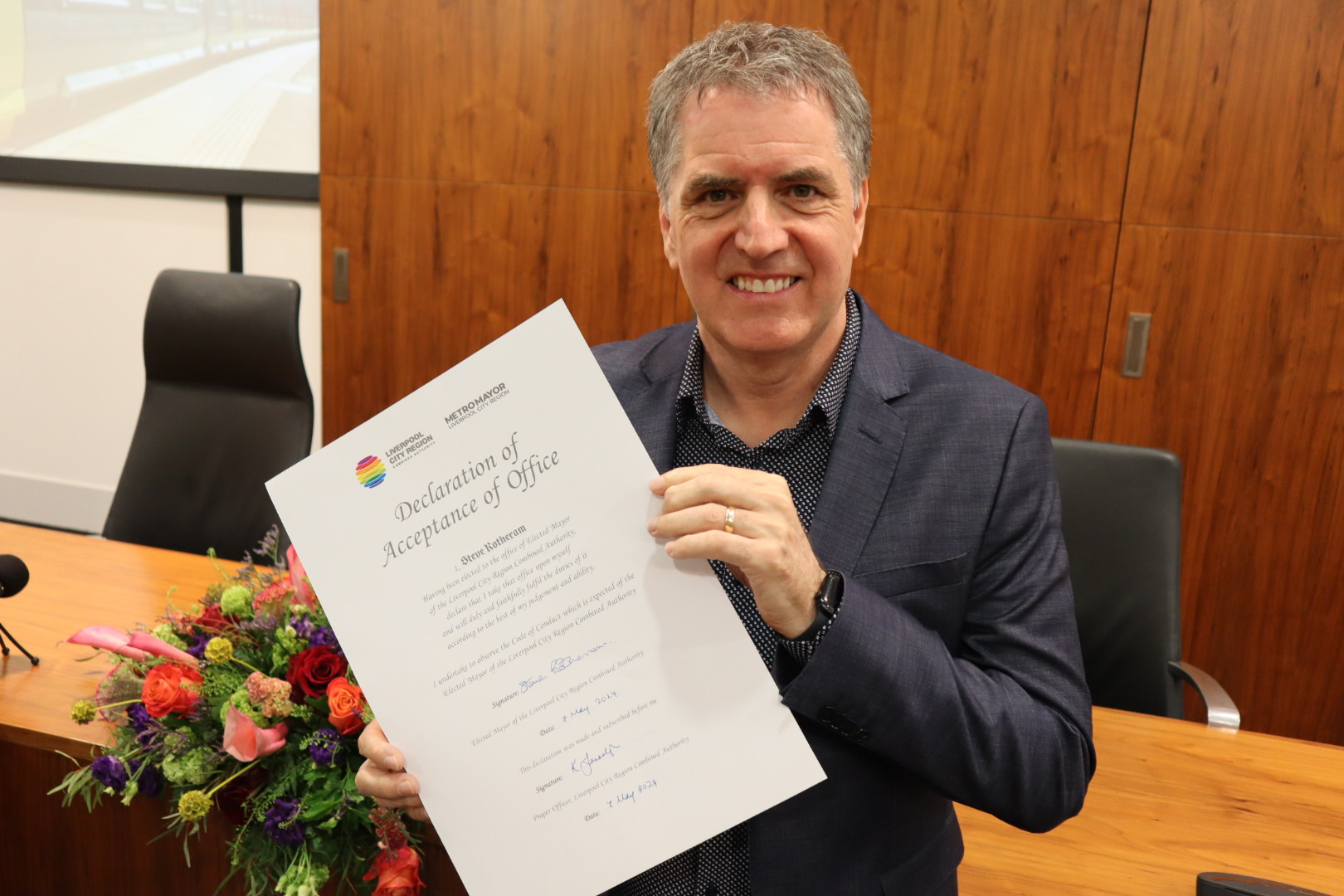 Mayor Rotheram with signed Acceptance of Office certificate