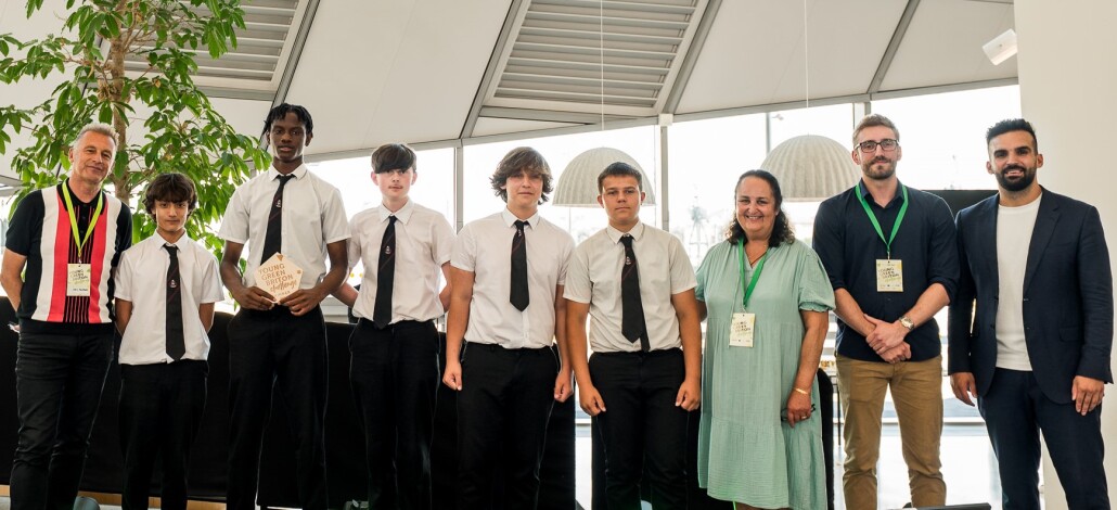 Chris Packham CBE (left) and Mete Coban MBE (right) with the Bouncepadz team from Kings Leadership Academy Hawthornes.