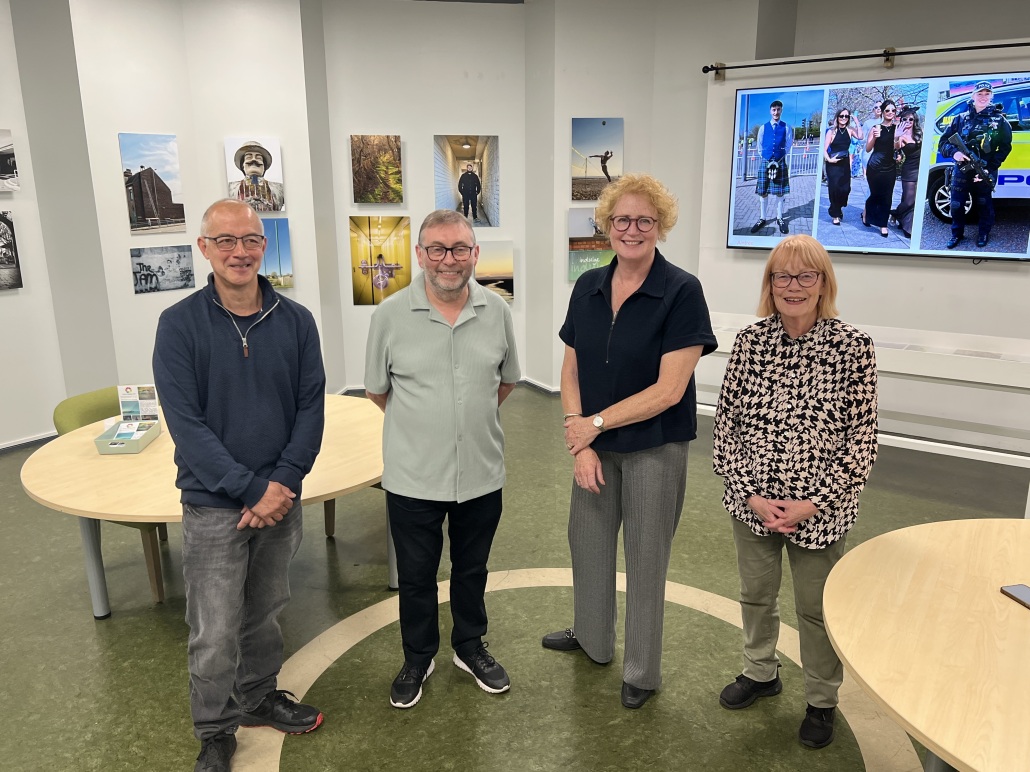 Photographer Stephanie Wynne (third from left) with members of Crosby Camera Club L-R Graham, Patrick and June.