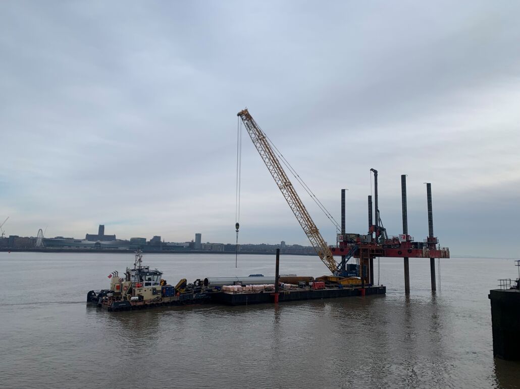 installing a steel pile eight metres into the Mersey’s riverbed, using a barge with specialist drilling equipment.