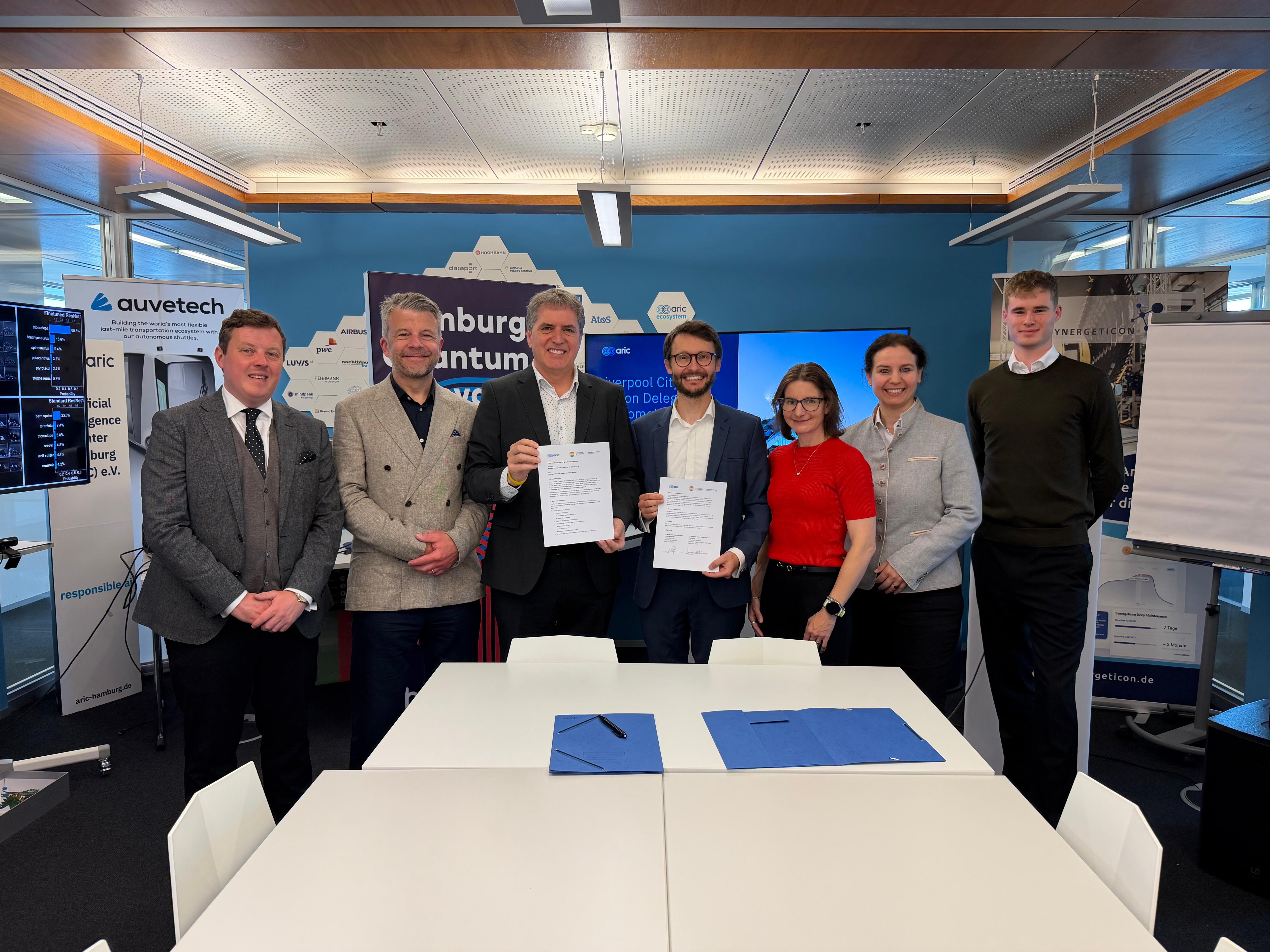 Liverpool City Region Mayor Steve Rotheram and ARIC CEO Alois Krtil at the signing of an MOU in Hamburg to develop a trans-European AI supercluster