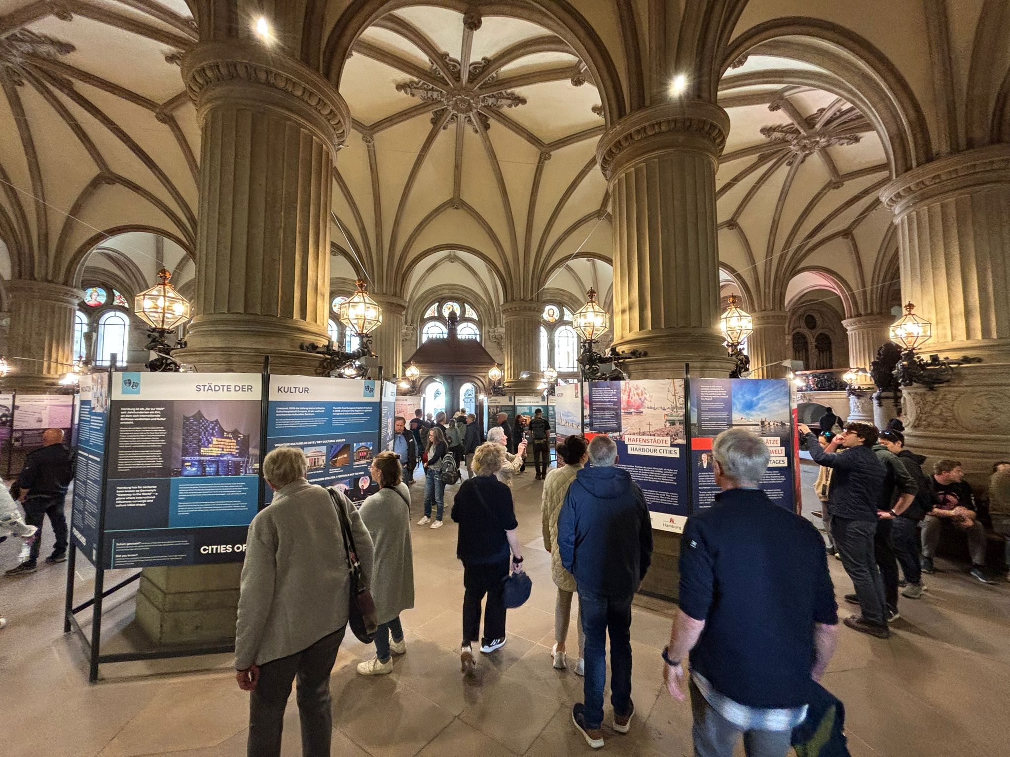 Visitors view the Liverpool City Region exhibition in Hamburg's City Hall in May 2026