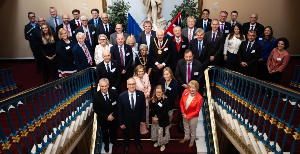 A group shot on the grand stairs at Liverpool Town Hall of dignitaries being welcomed to Liverpool